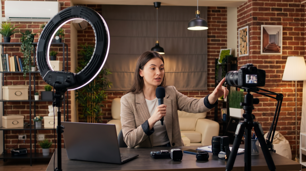 Digital content creator filming in a home studio representing Golden Visa nomination categories